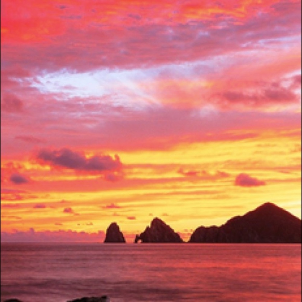 El Arco Sunset by Tomas Spangler